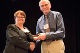 Janelle M. Bailey hands the Presidential Gavel to Incoming President, George A. Amann.
