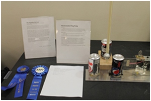 a first prize winner at the Apparatus competition of 2104 at the University of Minnesota.  Negative Ion Gun, Tom Senior, Loyola University, Chicago, IL.